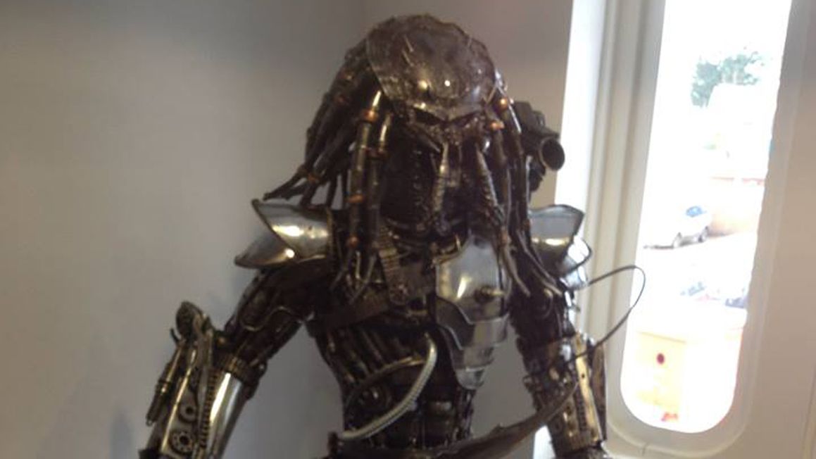 Predator statue that our team is getting ready to move